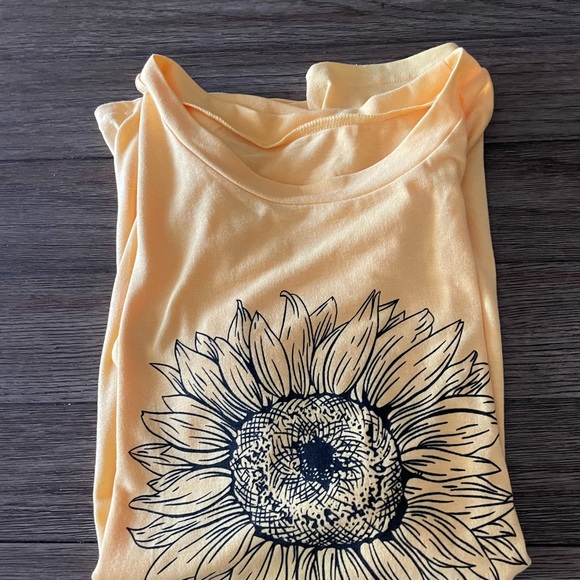 Sunflower T. This shirt fits more like a large. Runs small - Picture 2 of 10